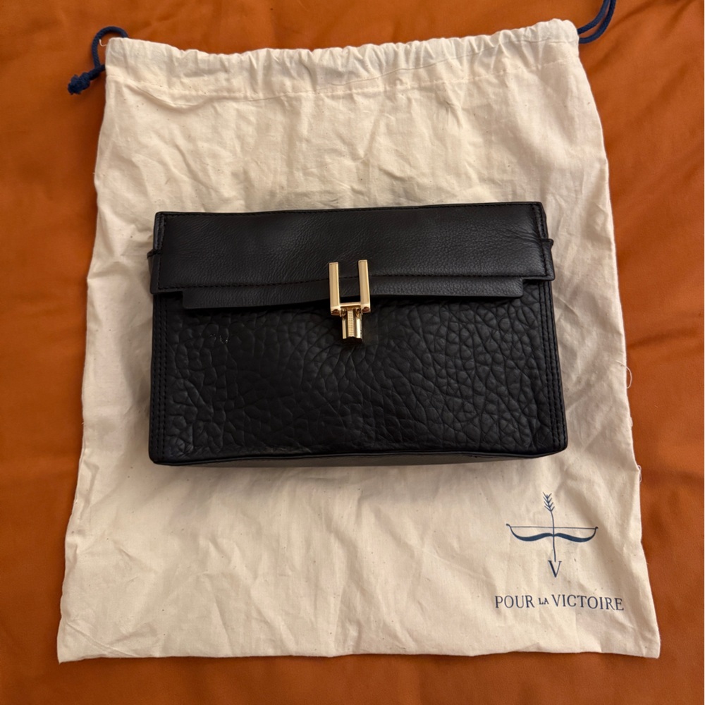 Pour La Victoire Textured Black Clutch with Gold Accent